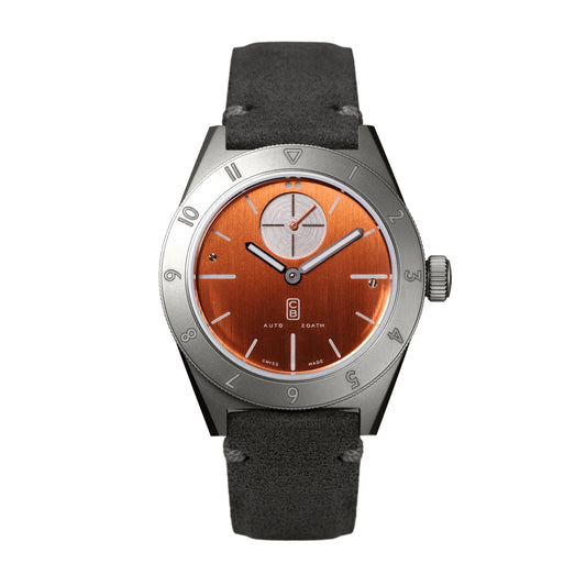 CB01 Ti orange made of repurposed grade 5 titanium. Swiss made men's mechanical watch. Alcantara handmade strap