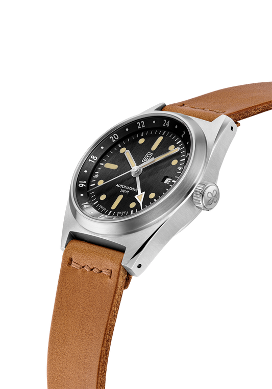 Side view of the black dial of the CB01-GMT 60, handmade light brown leather strap - Swiss made sustainable tool watch
