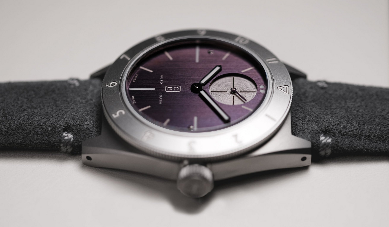 CB01 Ti wristwatch indigo dial closeup, and grey alcantara strap