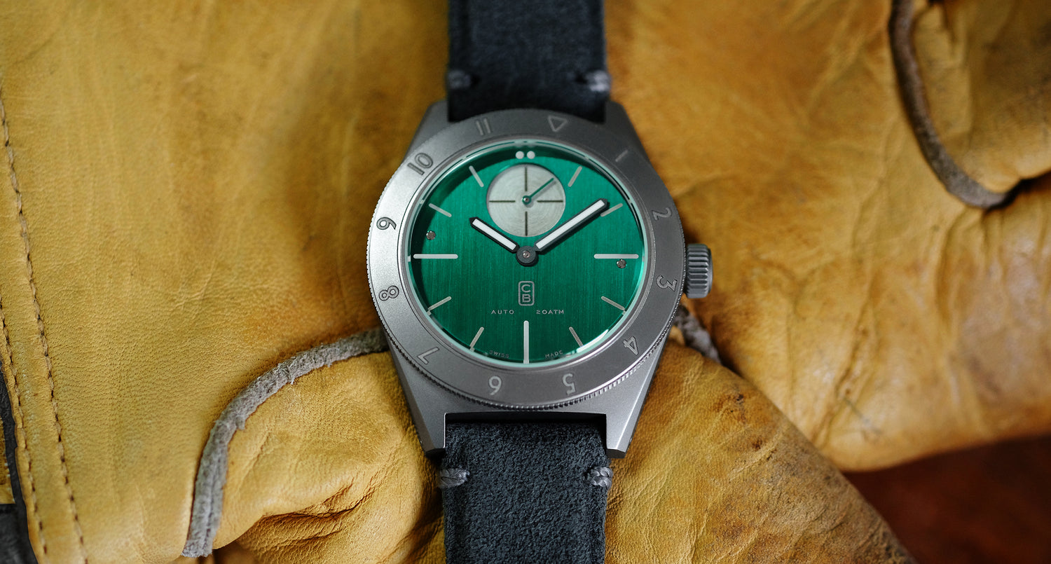 Cedric Bellon Watch with green dial made of repurposed titanium on yellow loves