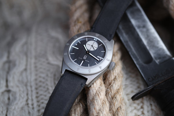 CB01 Ti watch with its black dial and handmade Alcantara strap