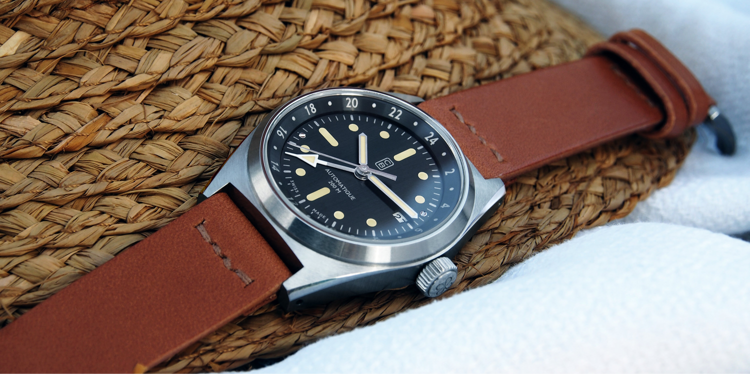 Recycled stainless steel CB watch Swiss made, GMT complication, black dial on a natural fiber hat
