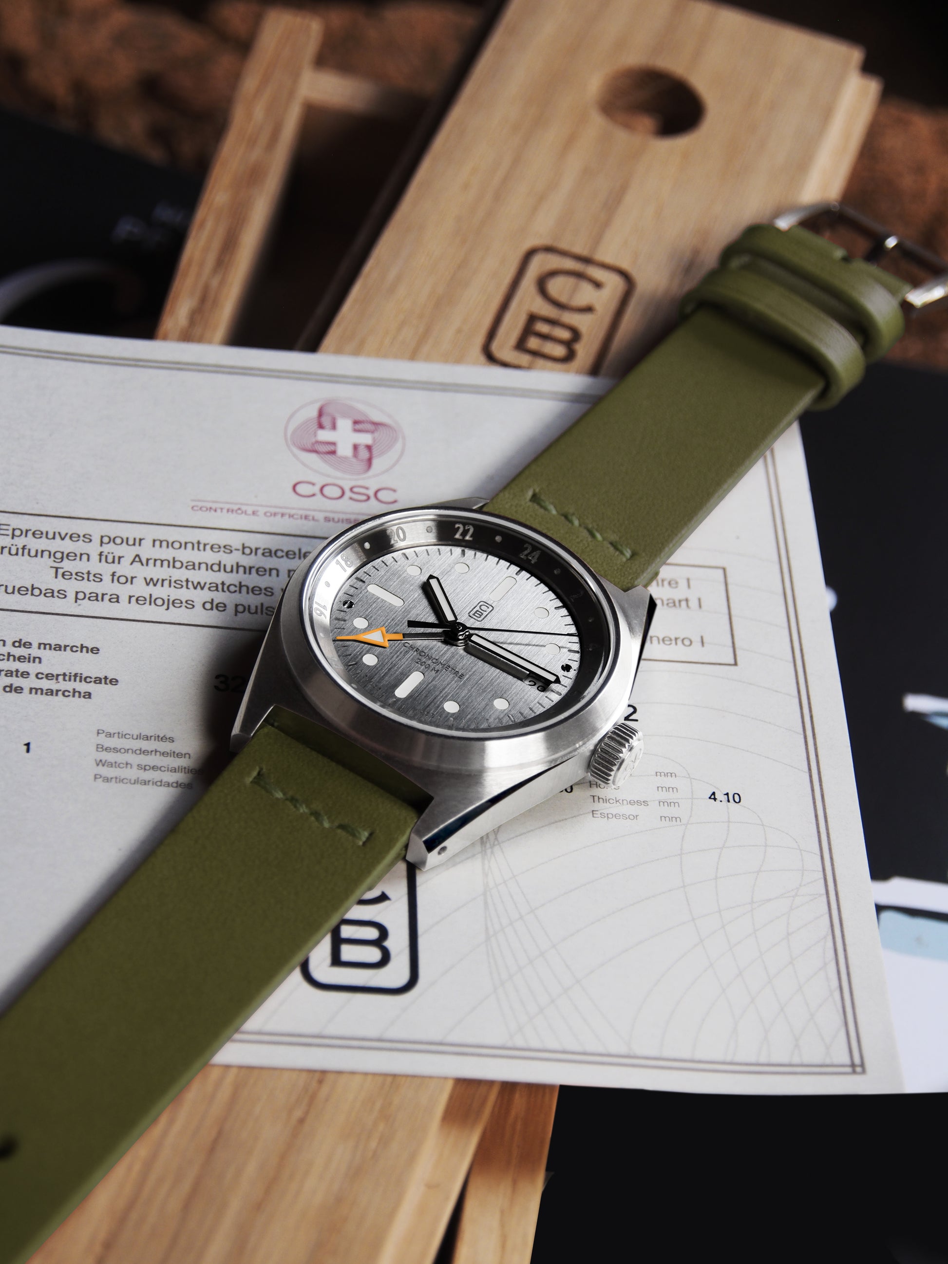 Chronometer GMT watch on its COSC certificate